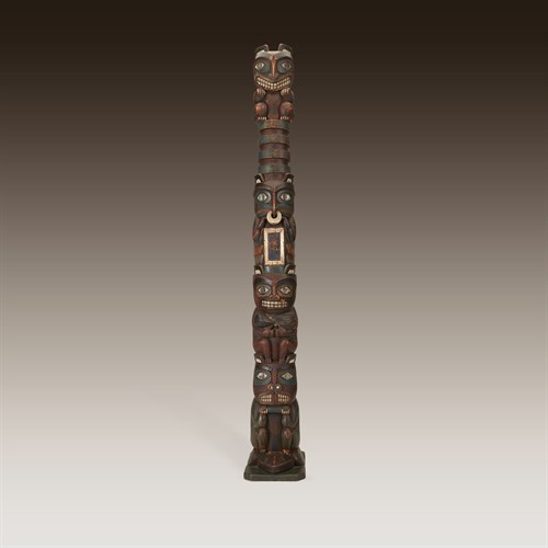 Lot 57 - A fine Northwest Coast carved, polychrome and abalone-inlaid totem pole model