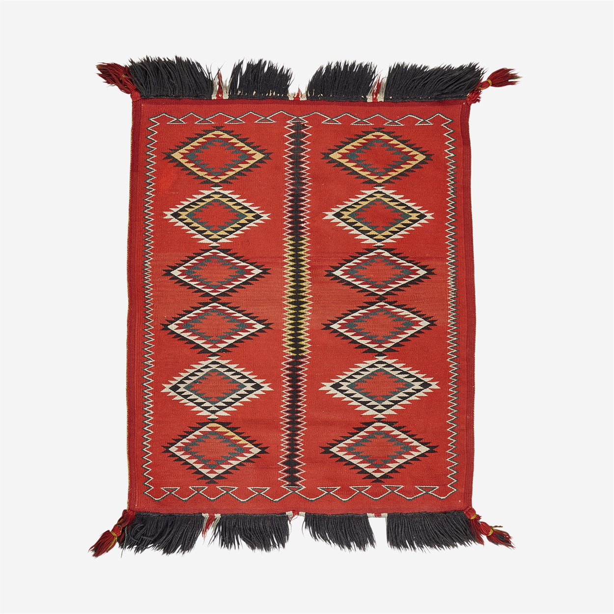 Lot 65 - A Navajo woven sampler with fringe