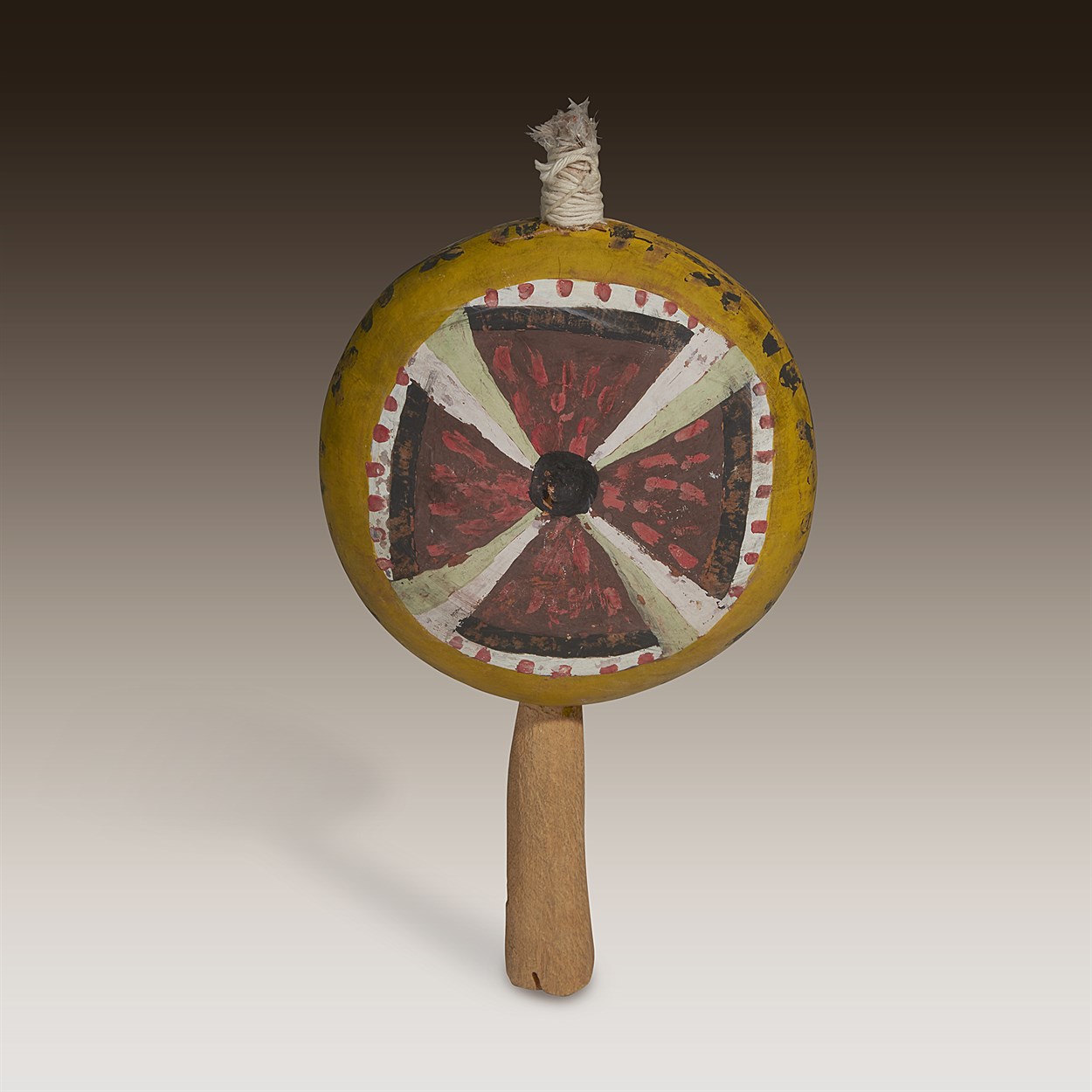 Lot 54 - A Pueblo painted and decorated gourd rattle