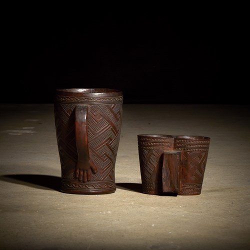 Lot 95 - Two Kuba palm wine cups