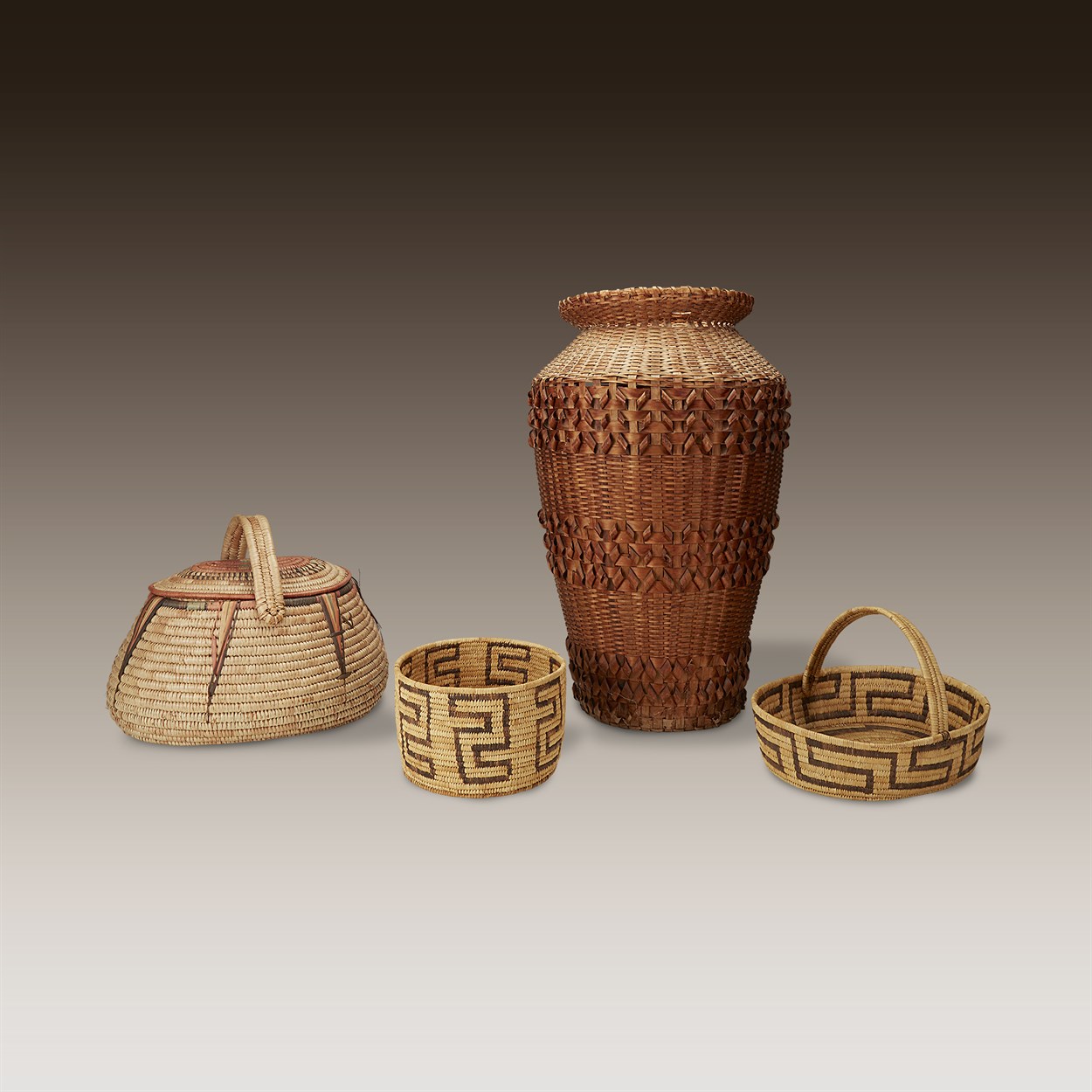 Lot 77 - A group of four large American Indian woven baskets