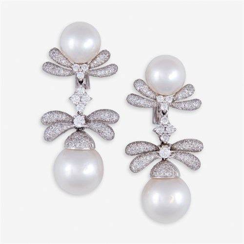 Lot 64 - A pair of South Sea pearl, diamond, and eighteen karat white gold earrings