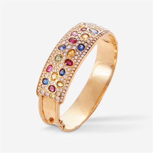 Lot 32 - An eighteen karat, diamond, and gem-set bracelet