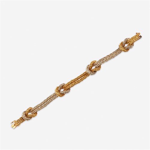 Lot 46 - A two-tone eighteen karat gold bracelet, Buccellati