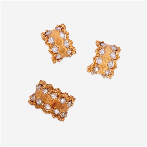 Lot 80 - A pair of eighteen karat gold and diamond earrings and a ring, Buccellati