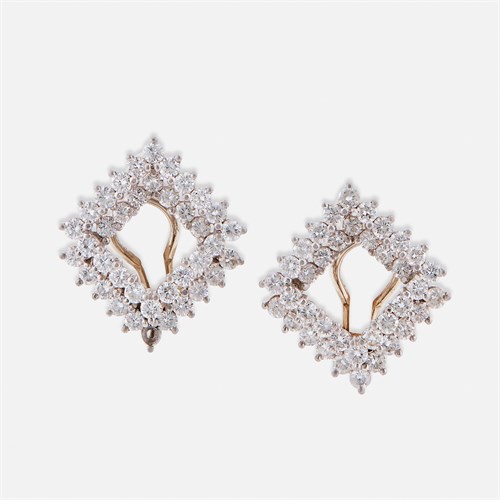 Lot 19 - A pair of platinum and diamond earclips, Angela Cummings