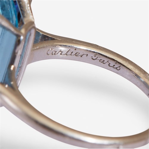 Lot 3 - An aquamarine, sapphire, and platinum ring, Cartier