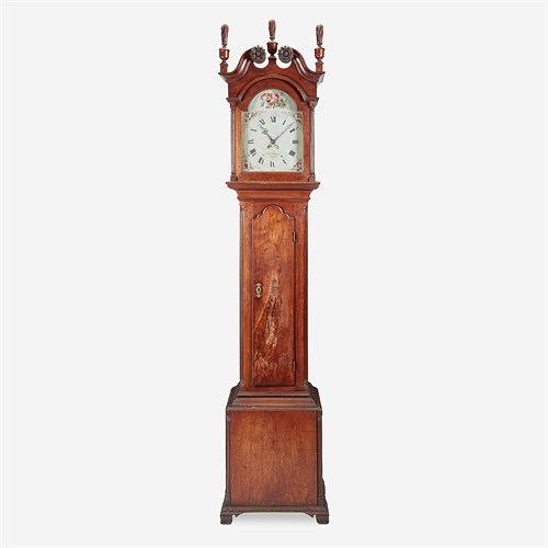 Lot 37 - A Chippendale carved walnut tall case clock