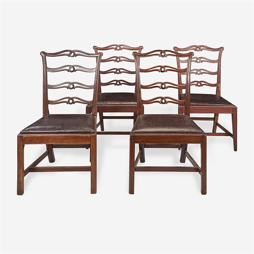 Lot 40 - An assembled group of four mahogany ribbon-back side chairs