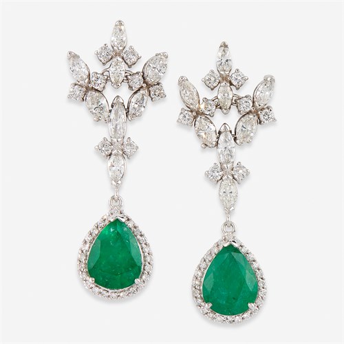 Lot 65 - A pair of emerald, diamond, and eighteen karat white gold pendant earrings