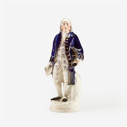 Lot 28 - A Staffordshire polychrome figure of Benjamin Franklin (1706-1790)