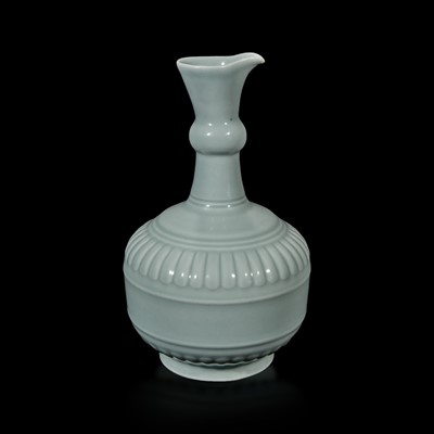 Lot 15 - A Chinese "claire de lune" or pale celadon-glazed pouring vessel, Huajiao
