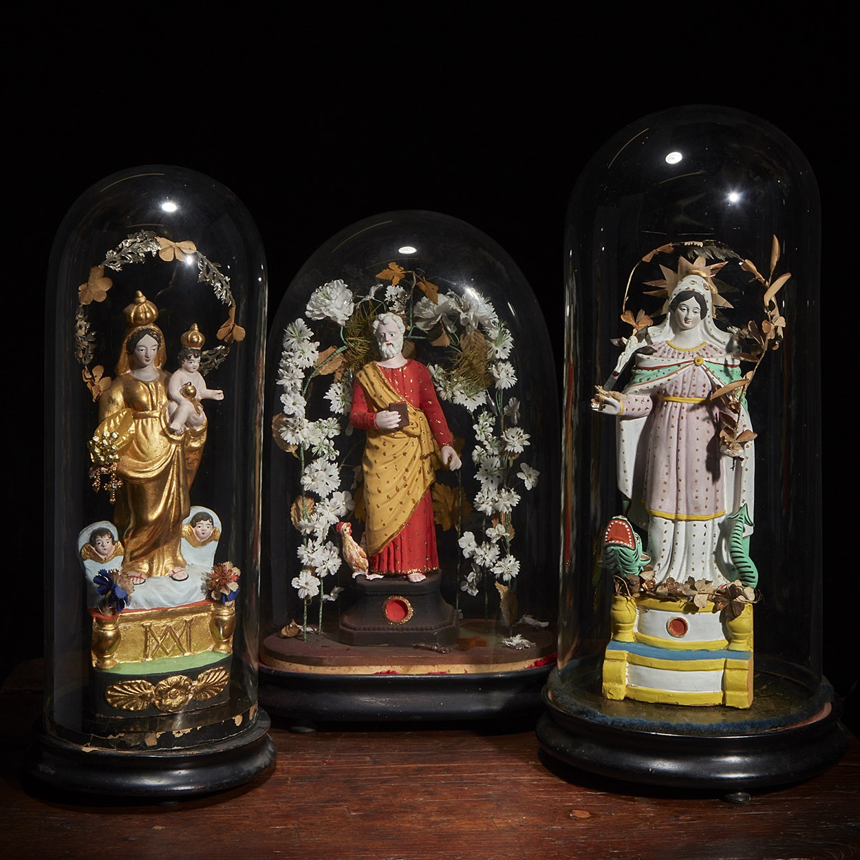 Lot 19 - Three santibelli depicting saints