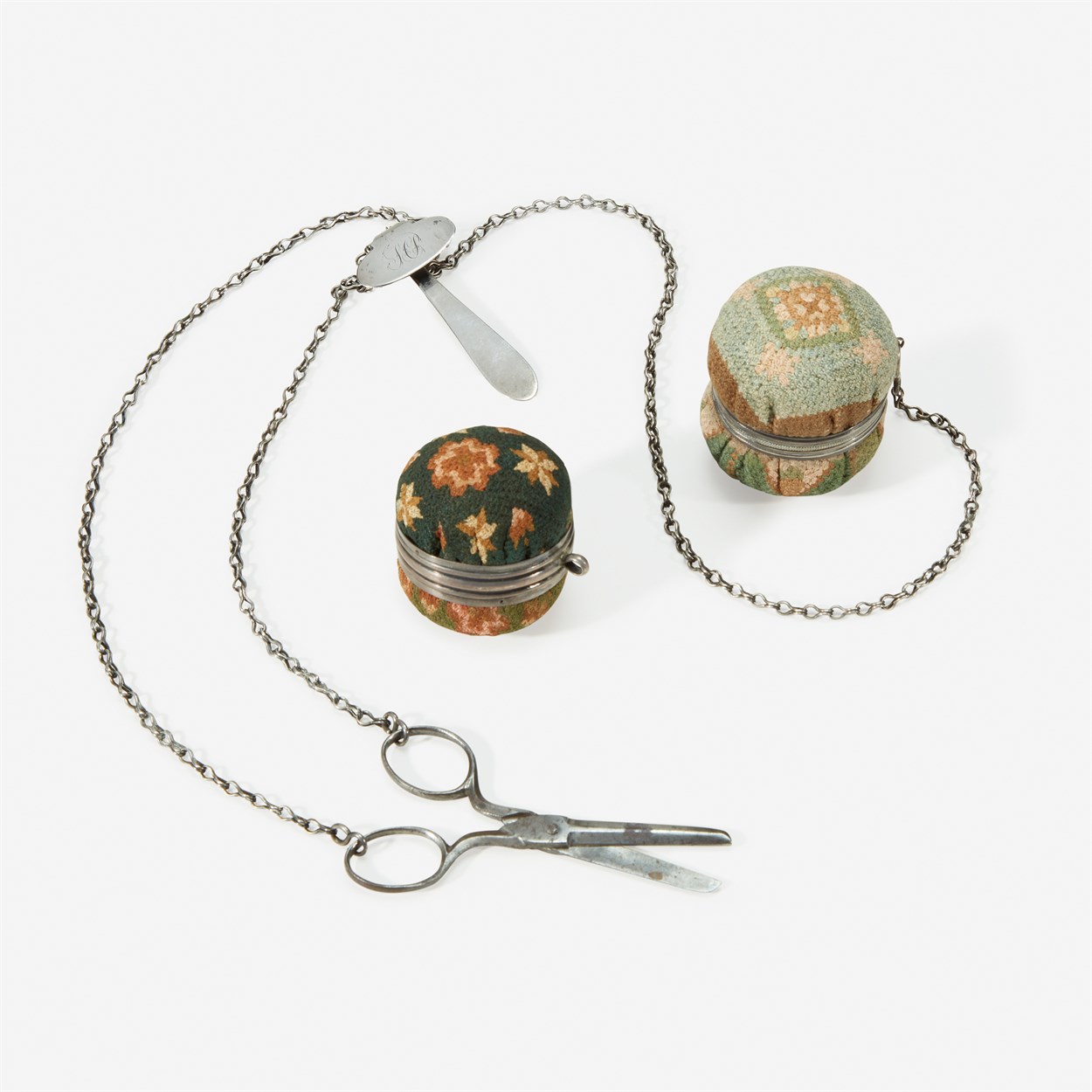 Lot 25 - A silver chatelaine with Queen-stitch pin ball