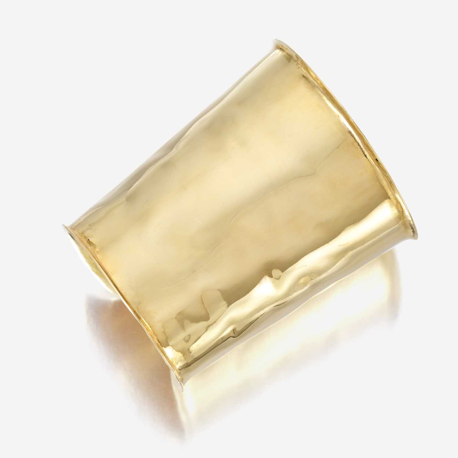 Lot 54 - An eighteen karat gold cuff bracelet