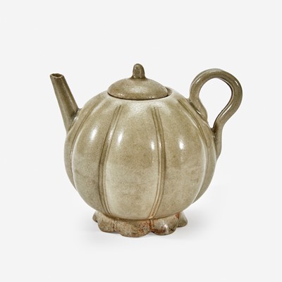 Lot 23 - A Chinese celadon-glazed melon-form small ewer and cover