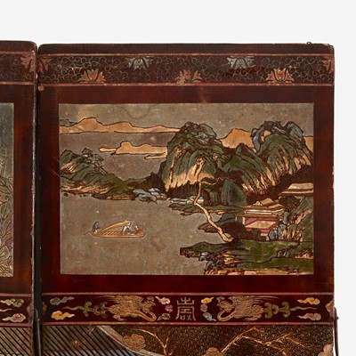 Lot 81 - A Chinese carved twelve-panel "Coromandel" folding screen