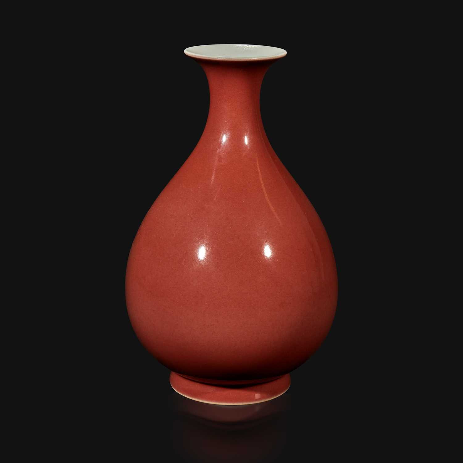 Lot 17 - A Chinese copper red-glazed bottle vase