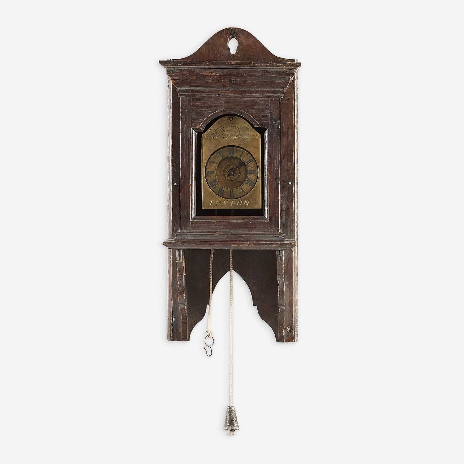 Lot 18 - A George I oak and brass wall clock