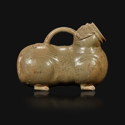 Lot 22 - A Chinese Yue ware chimera-form celadon vessel, Huzi