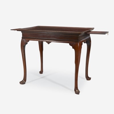 Lot 41 - A Queen Anne carved mahogany tea table