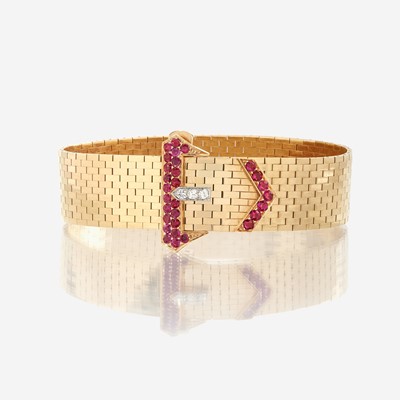 Lot 66 - A fourteen karat gold, ruby, and diamond strap bracelet, Tiffany & Co.
