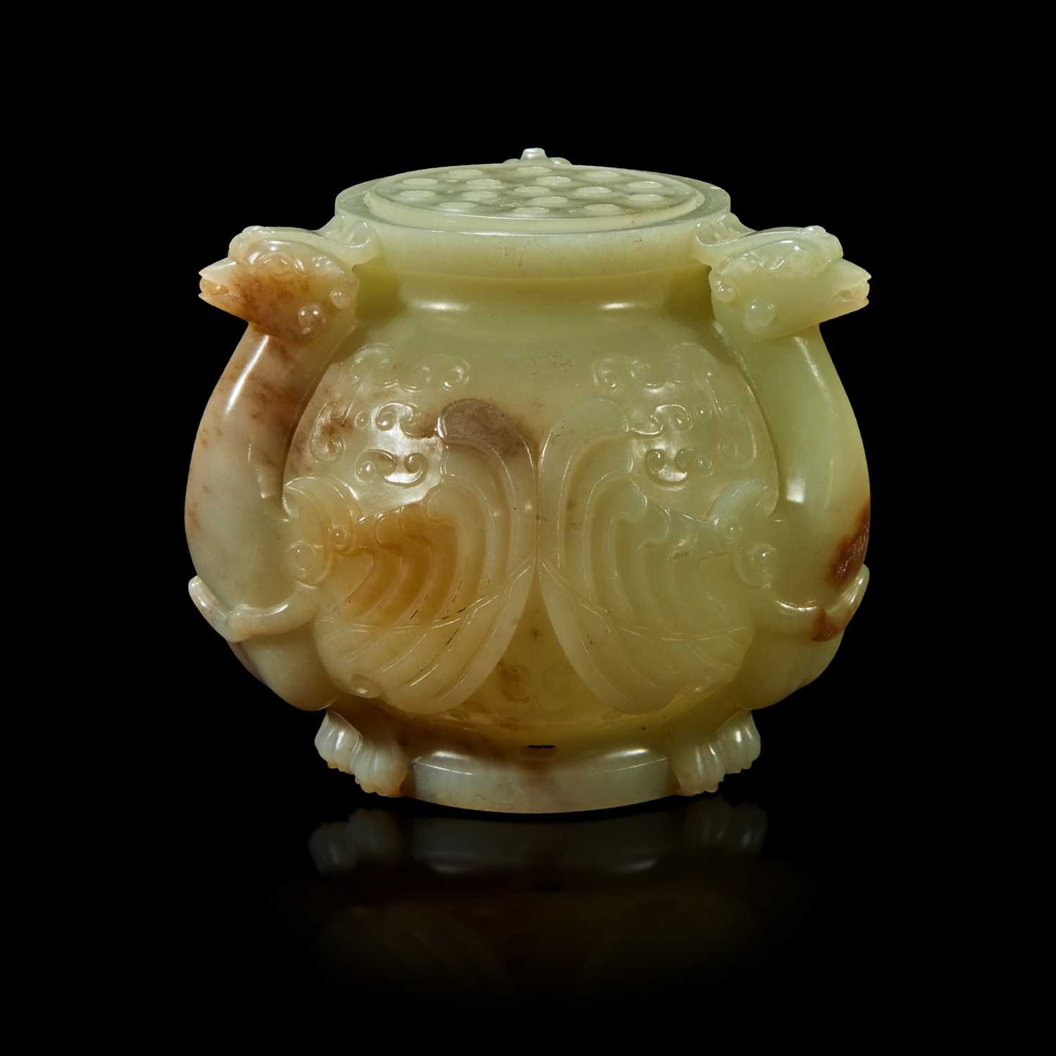 Lot 90 - A Chinese carved greyish celadon and beige jade archaistic "Birds" vessel and cover