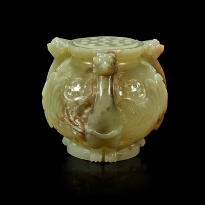 Lot 90 - A Chinese carved greyish celadon and beige jade archaistic "Birds" vessel and cover