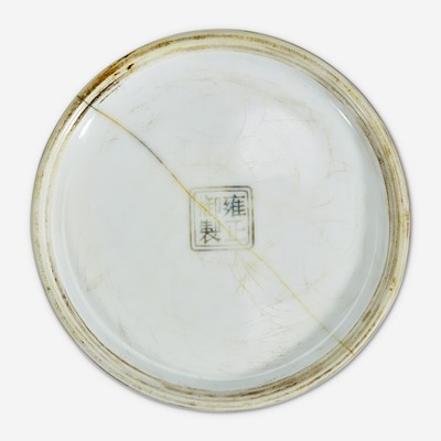 Lot 16 - A Chinese puce-enameled porcelain cylindrical brush pot