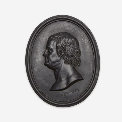 Lot 37 - A Wedgwood & Bentley black basalt portrait medallion of Benjamin Franklin (1706-1790)