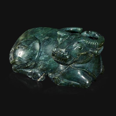 Lot 91 - A large Chinese spinach jade recumbent water buffalo