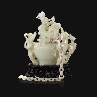 Lot 89 - A Chinese carved white jade "Boys" vase and cover