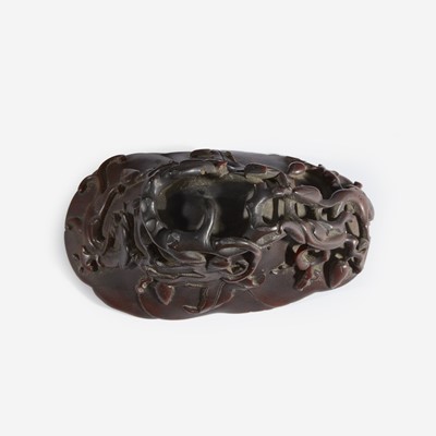 Lot 86 - A Chinese Carved Rhinoceros Horn Libation Cup