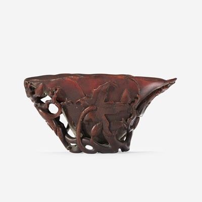 Lot 86 - A Chinese Carved Rhinoceros Horn Libation Cup