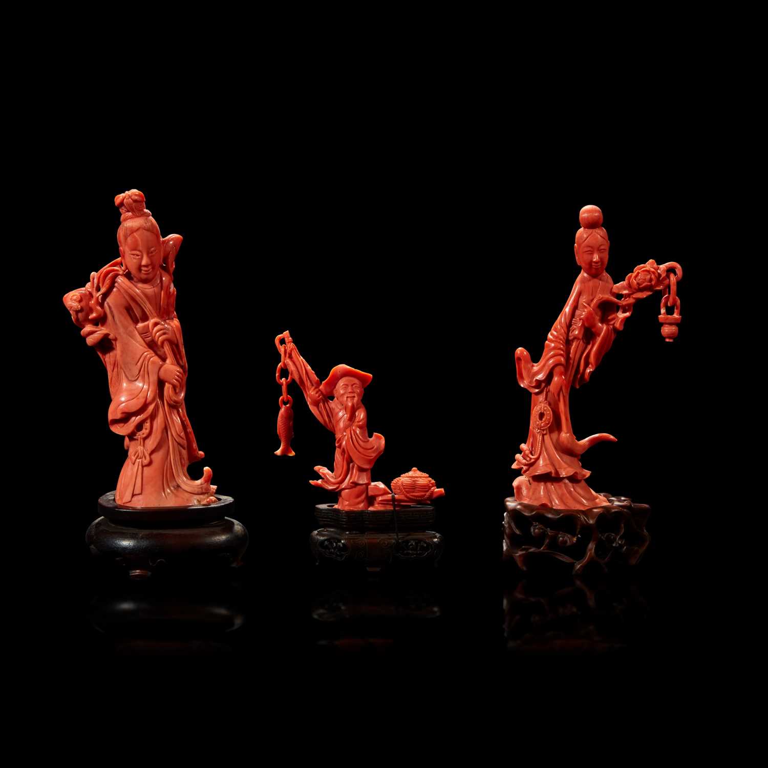 Lot 99 - Three Chinese carved coral figural groups, meiren and peach, man and basket, meiren and flower