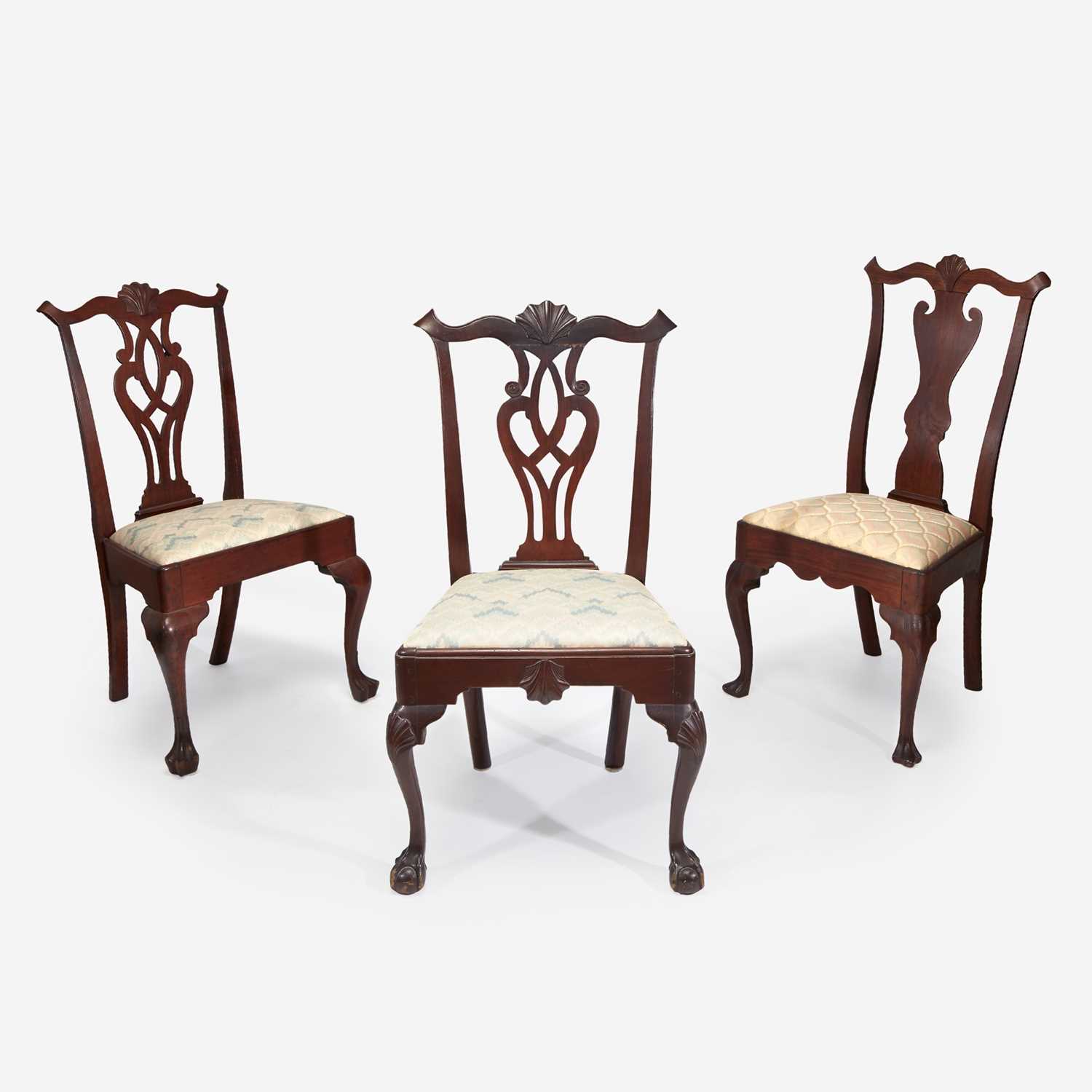 Lot 52 - Three Queen Anne / Chippendale carved walnut side chairs