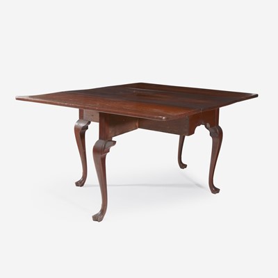 Lot 51 - A Queen Anne carved walnut drop-leaf table