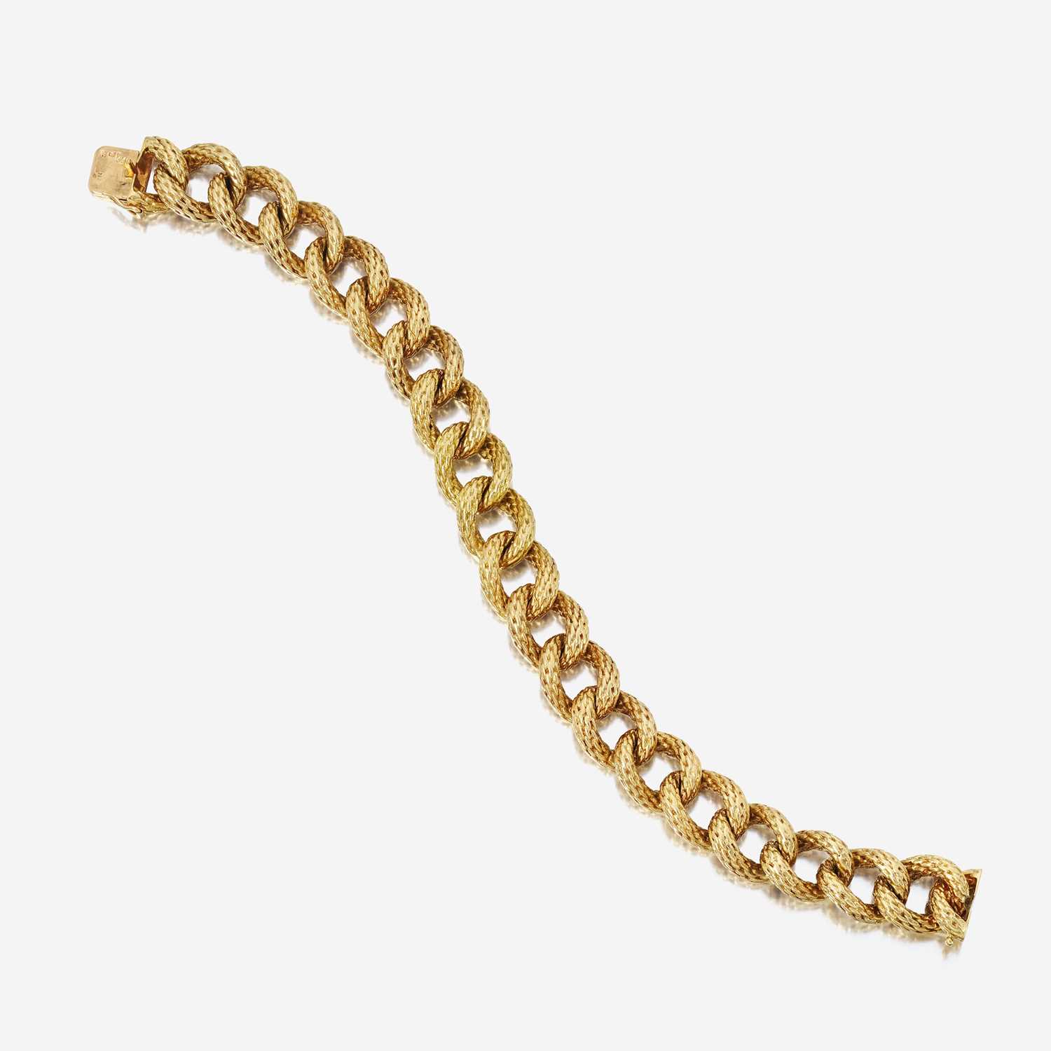 Lot 53 - An eighteen karat gold curb link bracelet, Cartier