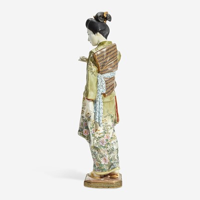 Lot 134 - A Japanese enameled Satsuma-type pottery figure of a bijin, Kinkozan studios