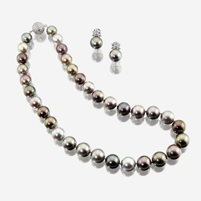 Lot 34 - A South Sea Tahitian cultured pearl, diamond, and eighteen karat white gold necklace with similar earclips