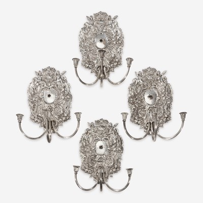 Lot 13 - A set of four William & Mary style silverplated wall lights
