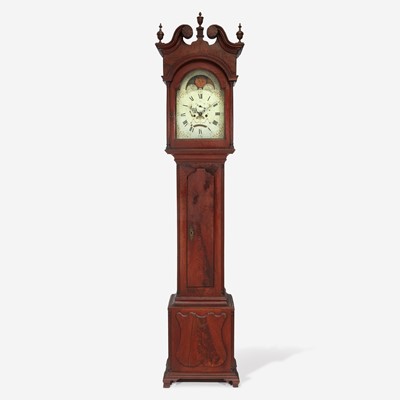 Lot 70 - A Chippendale carved walnut tall case clock
