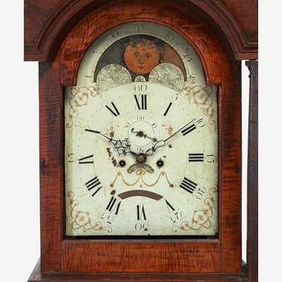Lot 70 - A Chippendale carved walnut tall case clock