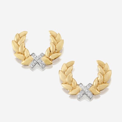 Lot 34 - A pair of eighteen karat gold, platinum, and diamond brooches, Tiffany & Co.