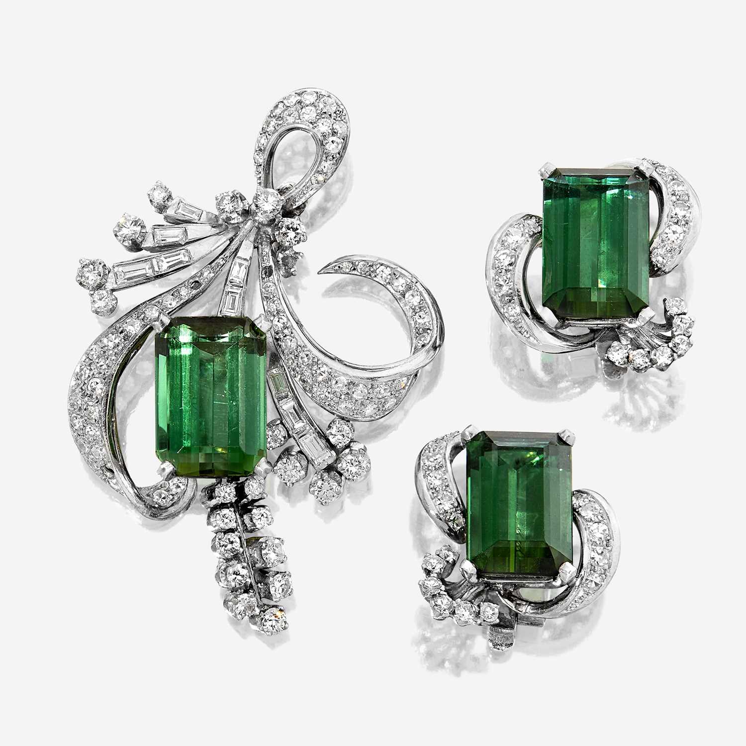 Lot 133 - A pair of green tourmaline, diamond, and platinum ear clips and brooch