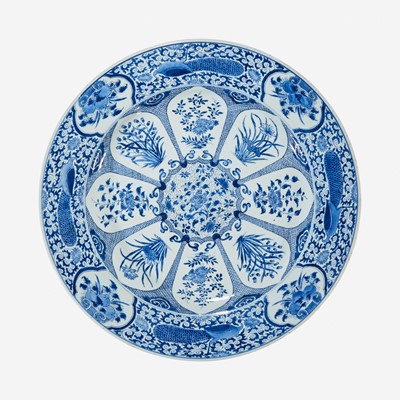 Lot 35 - A large Chinese blue and white “Peacock and Rosette” charger