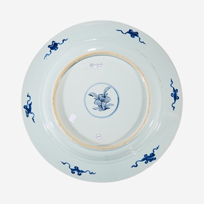 Lot 35 - A large Chinese blue and white “Peacock and Rosette” charger