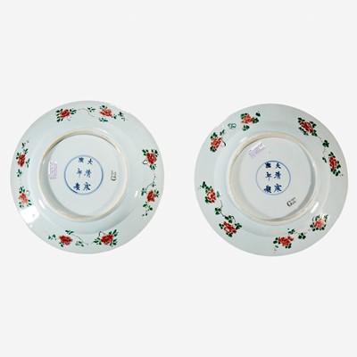 Lot 57 - Two similar Chinese famille verte-decorated porcelain “Phoenix and Peony” dishes