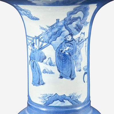 Lot 60 - A pair of Chinese blue and white powder-blue ground “Phoenix-tail” vases mounted as lamps