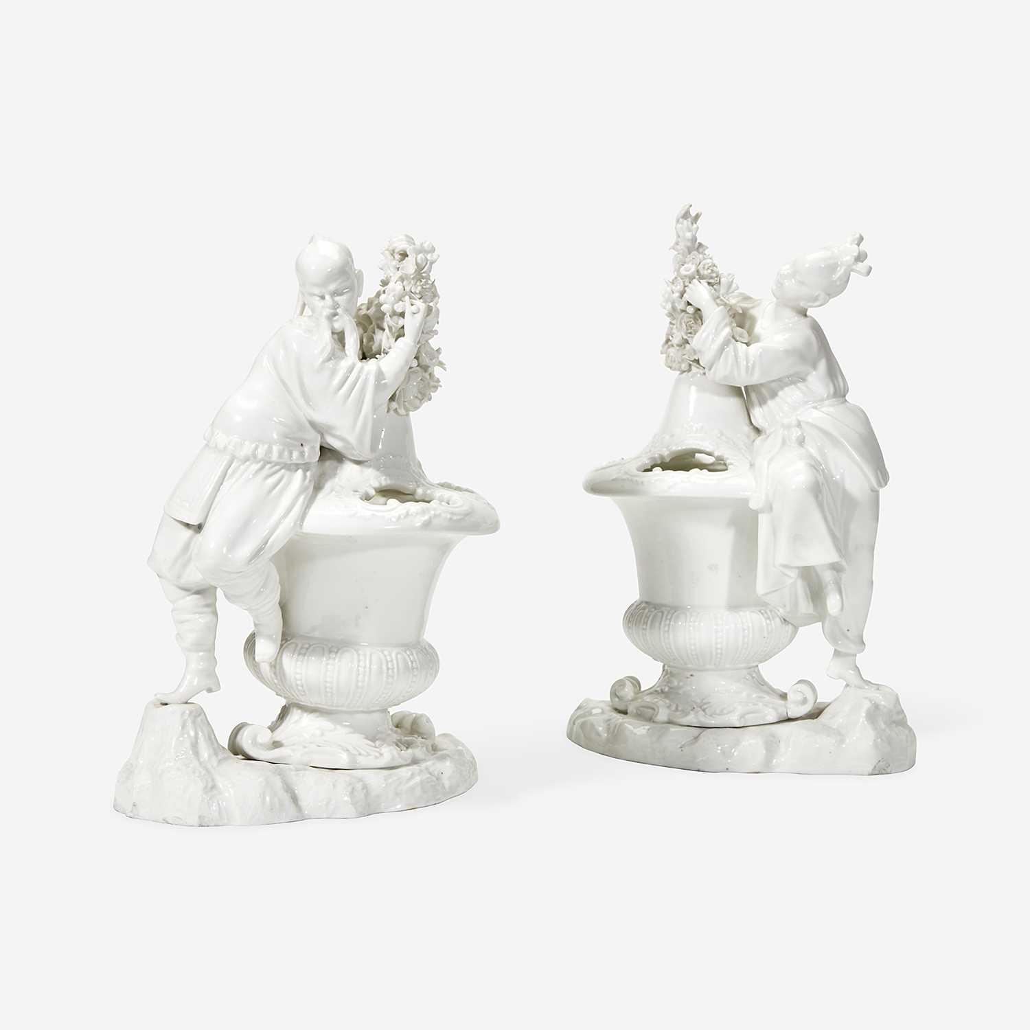 Lot 167 - A Pair of Continental Meissen Style White-Glazed Porcelain Figural Bough Pots